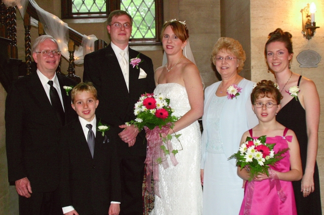Bill Brueck.  Aaron and Nicoles wedding 2005: Bill, Chandler, Aaron, Nicole, Linda, Bailey, and Carrie.