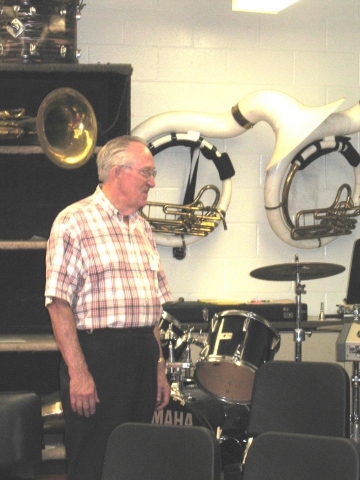 John Burns was the band director until 1962 for all 3 original elementary centers and he taught private lessons to Ballard students every summer. John is looking over the band room in the new part of the high school.